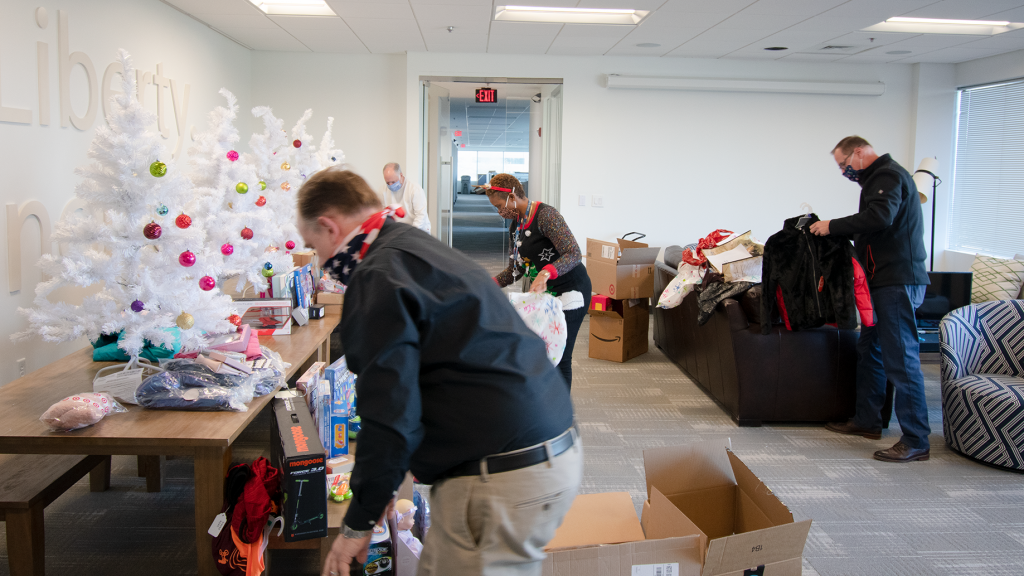 Employees packing gifts