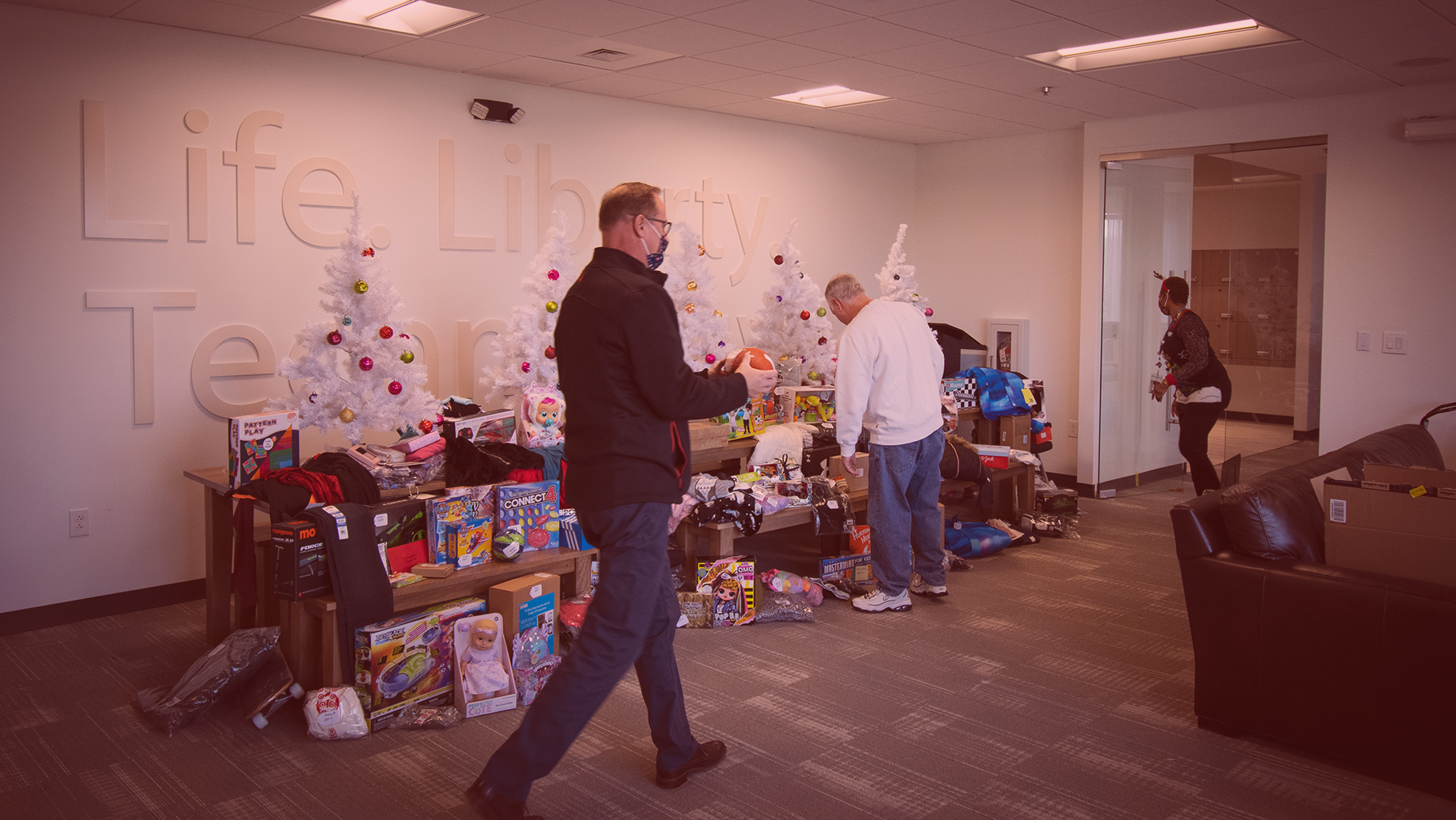 FCG Employees gathering gift donations